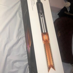 SELLING BRAND NEW DYSON- ONLY BECAUSE I AM MOVING TO EUROPE ( IT COMES UNOPENED)